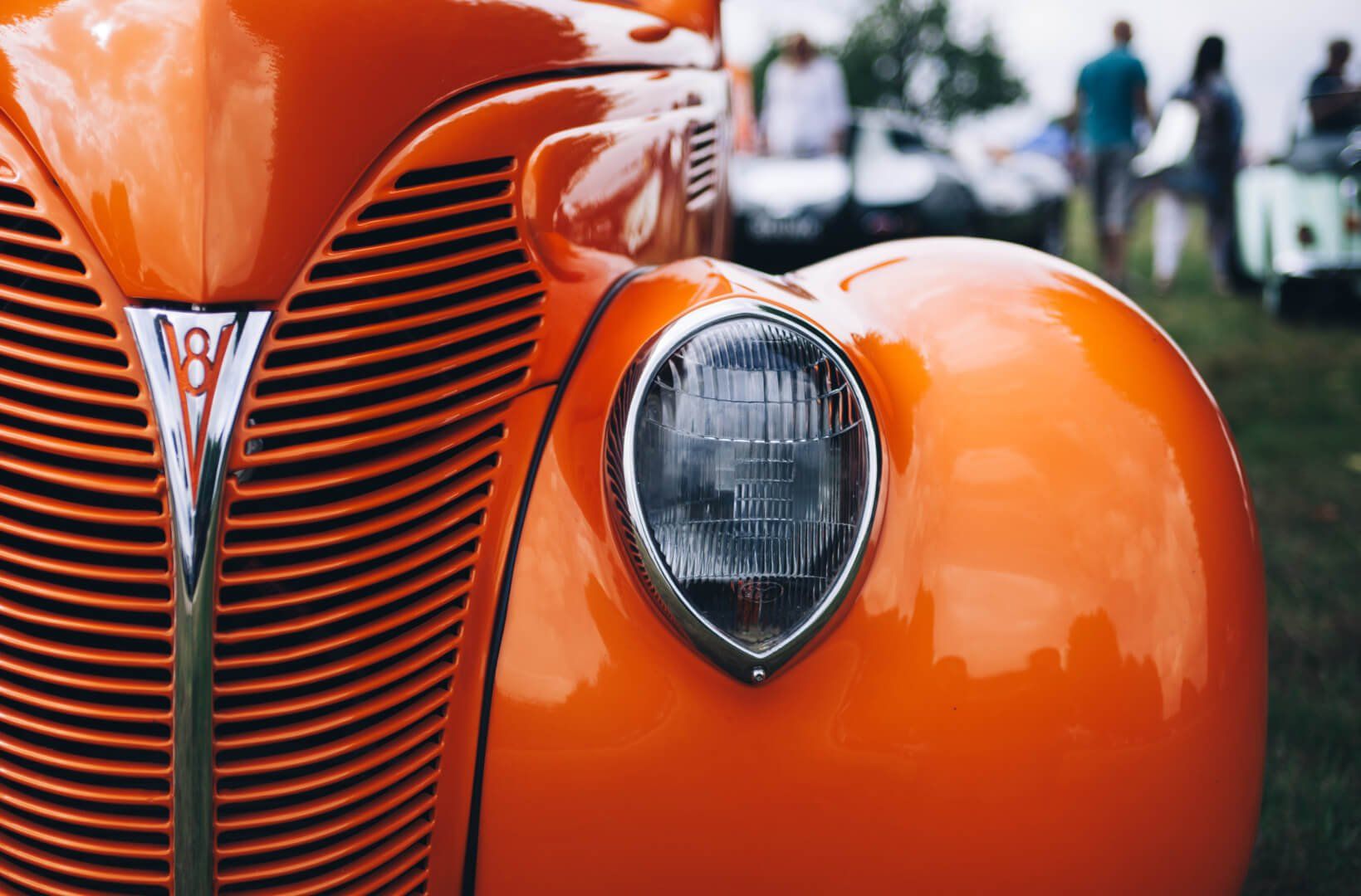 Orange classic car with V8 engine